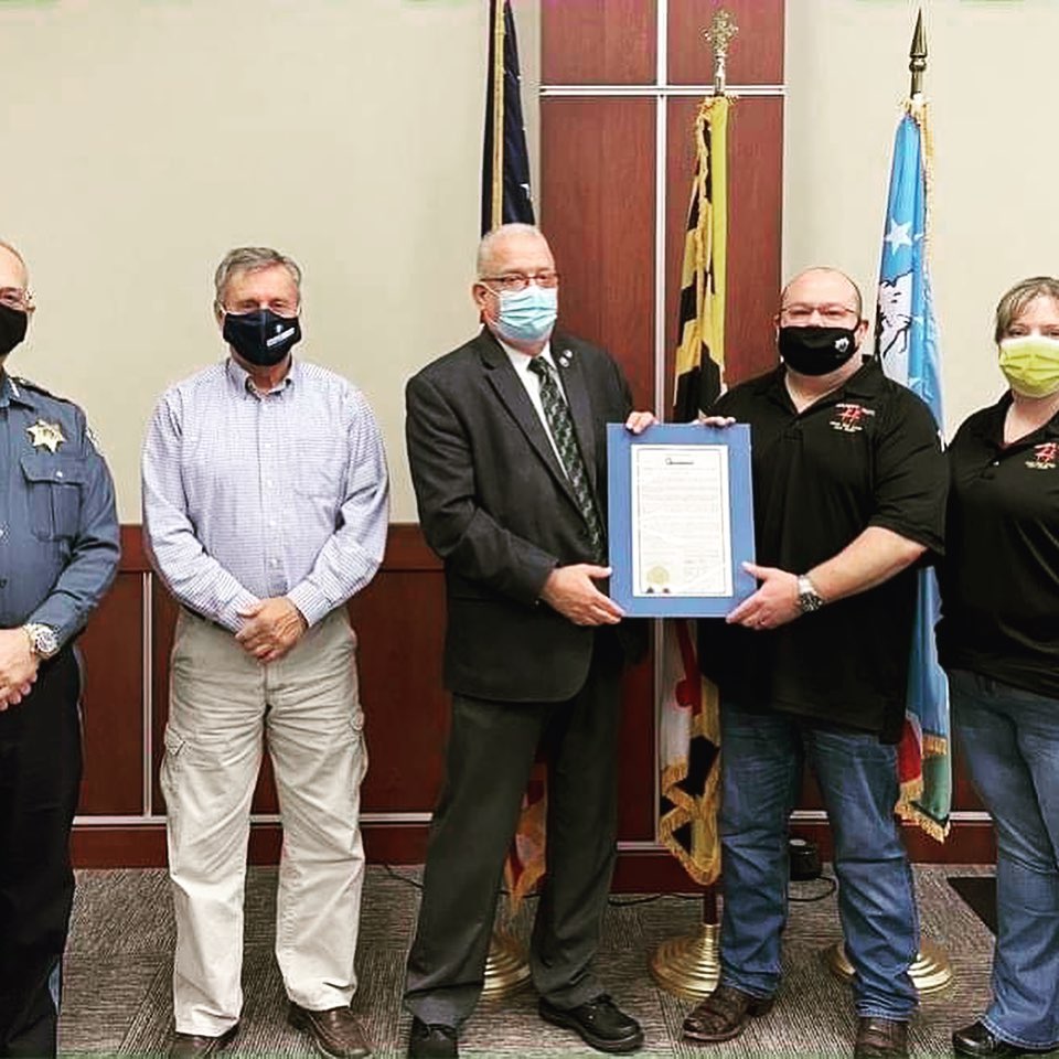 Copy of the Washington County, Maryland Second Amendment Sanctuary Resolution being presented to Tim Hafer of Hafer's Gunsmithing.