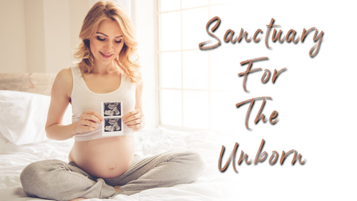 Picture of a mother holding an ultrasound - text reads: Sanctuary for the Unborn